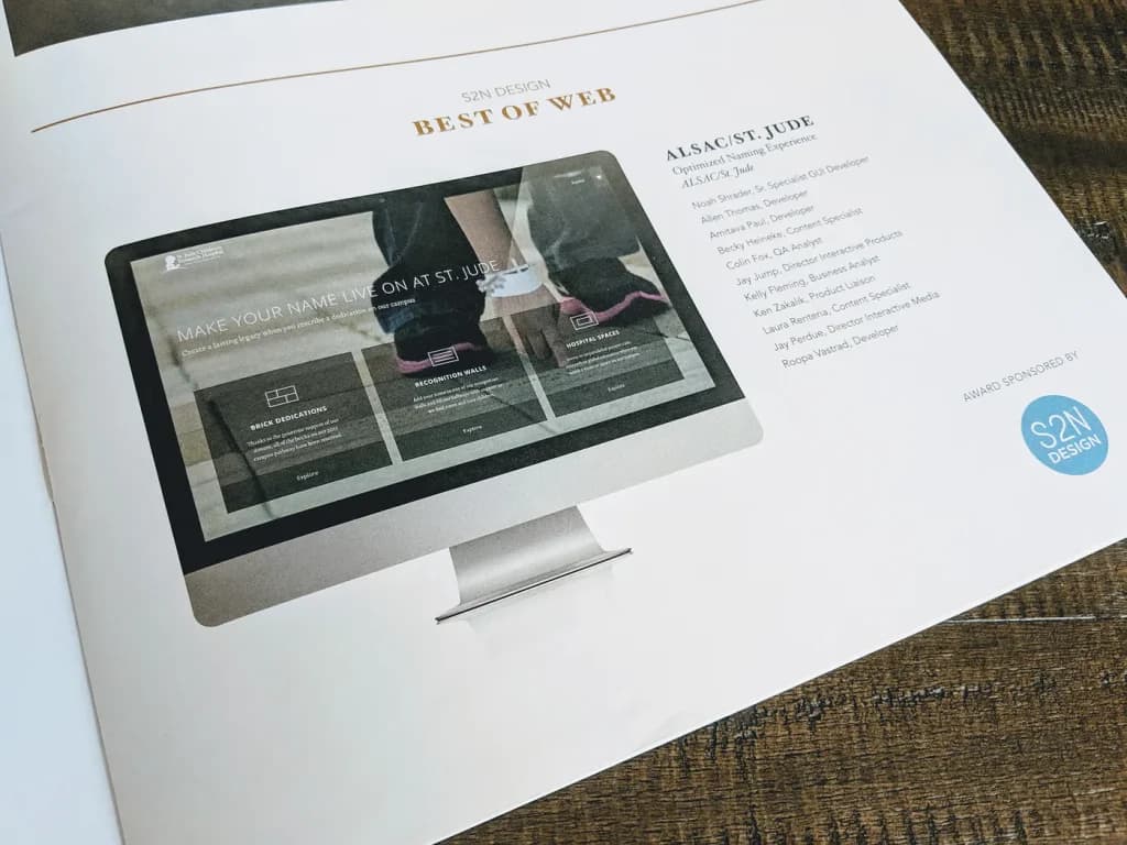 A page from the AAF program showing Best of Web and Gold awards for Interface and Navigation